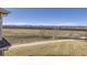 Backyard with a green lawn and view of distant mountains at 13001 Grant Cir # C, Thornton, CO 80241