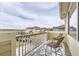 Cozy balcony with seating and scenic neighborhood views at 13001 Grant Cir # C, Thornton, CO 80241