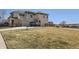 Inviting two-story home with a well-manicured lawn, two-car garage, and charming balcony, offering a comfortable suburban lifestyle at 13001 Grant Cir # C, Thornton, CO 80241