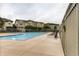 Enjoy the Community Pool, surrounded by lounging chairs and a gated fence at 13001 Grant Cir # C, Thornton, CO 80241