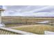 Scenic view from the property overlooking an open field and distant mountains at 13001 Grant Cir # C, Thornton, CO 80241
