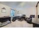 Functional home office with desk, comfortable chair, and ample natural light for a productive workspace at 7751 S Curtice Dr # E, Littleton, CO 80120