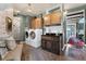 Convenient laundry room featuring modern machines, wooden cabinets, and stylish design at 1935 Bashley Rd, Monument, CO 80132