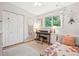 Serene bedroom with a whimsical design, natural light, and a cozy atmosphere at 6068 S Clayton St, Centennial, CO 80121