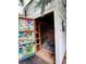 Unique shed with a colorful door and rustic interior at 6068 S Clayton St, Centennial, CO 80121