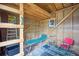Inside view of a shed, featuring wooden frame and simple furnishings at 6068 S Clayton St, Centennial, CO 80121