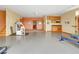 Expansive basement with exercise equipment, kitchenette, and versatile open space for recreation at 25803 Aspen Way, Golden, CO 80401