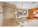 Spacious bathroom with glass-enclosed shower, soaking tub, and stylish finishes for a spa-like experience at 25803 Aspen Way, Golden, CO 80401