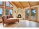 Cozy sitting area with fireplace and access to the outside patio, offering a tranquil retreat at 25803 Aspen Way, Golden, CO 80401