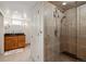 Modern bathroom showcasing a glass door shower and granite countertop vanity at 317 N Lafayette St, Denver, CO 80218