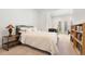 Bright bedroom with carpet and a desk area at 317 N Lafayette St, Denver, CO 80218