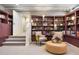 Cozy living room featuring custom built-in bookshelves with accent lighting at 317 N Lafayette St, Denver, CO 80218