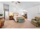 Bright bedroom featuring a sitting area, desk, vaulted ceiling, and plenty of space at 317 N Lafayette St, Denver, CO 80218