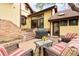 Comfortable backyard patio with stylish furniture and BBQ at 317 N Lafayette St, Denver, CO 80218