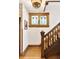 Wooden staircase with decorative window, and classic wood trim at 317 N Lafayette St, Denver, CO 80218