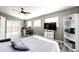 Spacious bedroom features a modern ceiling fan and natural light at 5032 Nighthawk Pkwy, Brighton, CO 80601