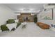 Finished basement features neutral carpet, built-in desk, and a comfortable seating area at 864 Garfield St, Denver, CO 80206