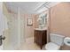 Bathroom with walk-in shower, updated vanity, and modern fixtures at 864 Garfield St, Denver, CO 80206