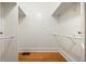 Spacious walk-in closet with built-in shelving and clothing rods at 864 Garfield St, Denver, CO 80206
