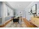 Elegant dining room with a sleek table, modern decor, and ample natural light at 864 Garfield St, Denver, CO 80206