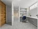 Bright home office with built-in shelving and desk space, next to a spacious closet at 864 Garfield St, Denver, CO 80206
