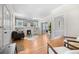 Bright living room with hardwood floors, built-in shelves, and modern decor at 864 Garfield St, Denver, CO 80206
