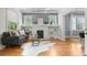 Cozy living room featuring hardwood floors, neutral tones, and stylish furnishings at 864 Garfield St, Denver, CO 80206