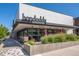 Corner view of Hopdoddy Burger Bar showing outdoor dining and modern architectural details at 864 Garfield St, Denver, CO 80206