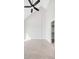 A bright room has tall ceilings, neutral carpet, and access to a walk-in closet at 4232 Jason St # 2, Denver, CO 80211