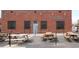 Brewery exterior with outdoor picnic tables and signage, creating a relaxed atmosphere at 4232 Jason St # 2, Denver, CO 80211