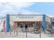 Huckleberry Roasters building featuring vibrant murals and window seating at 4232 Jason St # 2, Denver, CO 80211