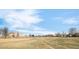 An open park area has a baseball field, a grass field, and a few trees at 4232 Jason St # 2, Denver, CO 80211