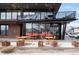 Exterior view of Dumpling Kitchen with outdoor seating and visible signage at 4232 Jason St # 2, Denver, CO 80211