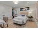 Bright bedroom with a plush bed, bench, and stylish decor, offering a relaxing retreat at 2580 Saddleback Dr, Castle Rock, CO 80104