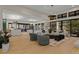 Spacious living room featuring hardwood floors, stylish furniture, and abundant natural light at 2580 Saddleback Dr, Castle Rock, CO 80104