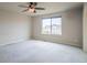 Bedroom with plush carpet and great natural lighting at 643 Ranchhand Dr, Berthoud, CO 80513