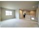 Bonus room with neutral carpet and great natural lighting at 643 Ranchhand Dr, Berthoud, CO 80513