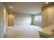 Spacious living room with large window for natural light at 643 Ranchhand Dr, Berthoud, CO 80513