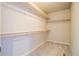 A spacious walk-in closet with multiple shelves and ample storage space, perfect for organization at 643 Ranchhand Dr, Berthoud, CO 80513