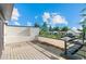Deck with wood flooring and railing, offering stunning views of the neighborhood at 2745 Java Ct, Denver, CO 80211