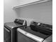 Convenient laundry room equipped with modern washer and dryer units at 2745 Java Ct, Denver, CO 80211