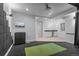Finished basement featuring a recreation room with a wet bar and entertainment area at 2745 Java Ct, Denver, CO 80211