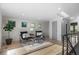 Bright sitting area with modern chairs, hardwood floors and plenty of natural light at 2745 Java Ct, Denver, CO 80211