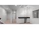 Basement wet bar featuring modern lighting and ample counter space at 2745 Java Ct, Denver, CO 80211