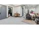 Finished basement featuring neutral walls and carpet with several seating areas at 14938 Vienna Cir, Parker, CO 80134