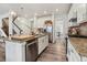 Well-equipped kitchen with granite countertops, stainless steel appliances, and hardwood floors at 14938 Vienna Cir, Parker, CO 80134