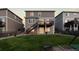 A beautiful backyard provides a patio and second-story deck, with a lush lawn at 7536 Grady Cir, Castle Rock, CO 80108