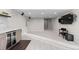 Finished basement area with wet bar, large screen television, and plenty of lighting at 7536 Grady Cir, Castle Rock, CO 80108