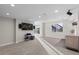 Spacious finished basement perfect for entertaining with carpeted floors and a walkout to the back at 7536 Grady Cir, Castle Rock, CO 80108