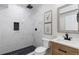 Bathroom featuring a large shower with marble tiling, and modern vanity at 7536 Grady Cir, Castle Rock, CO 80108